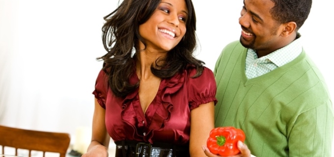 couple dress in holiday attire at holiday table